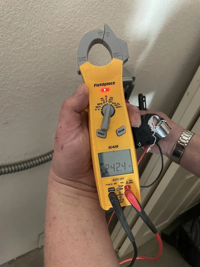 Voltage testing with clamp meter during Generator Installation in Jamestown